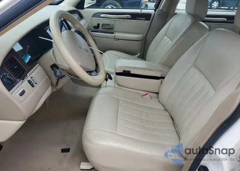 2007 Lincoln Town Car Signature z USA, uszkodzony, nr VIN 1LNHM81W97Y600466